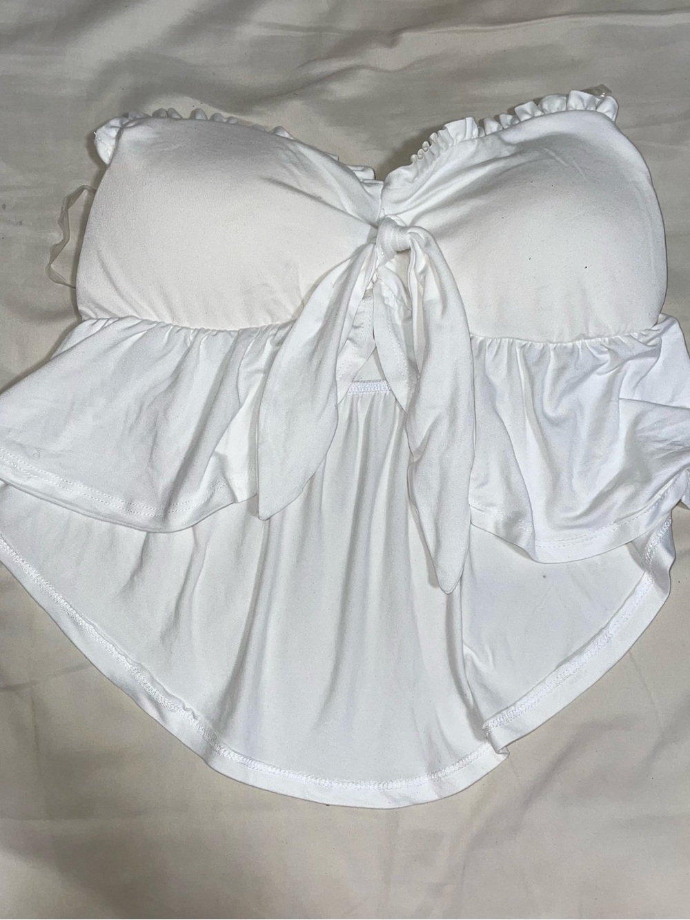 Almost Famous White Tie-Front Ruffled Peplum Camisole